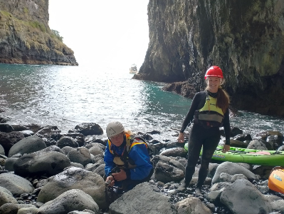 Survey team collecting rubbish  during penguin survey